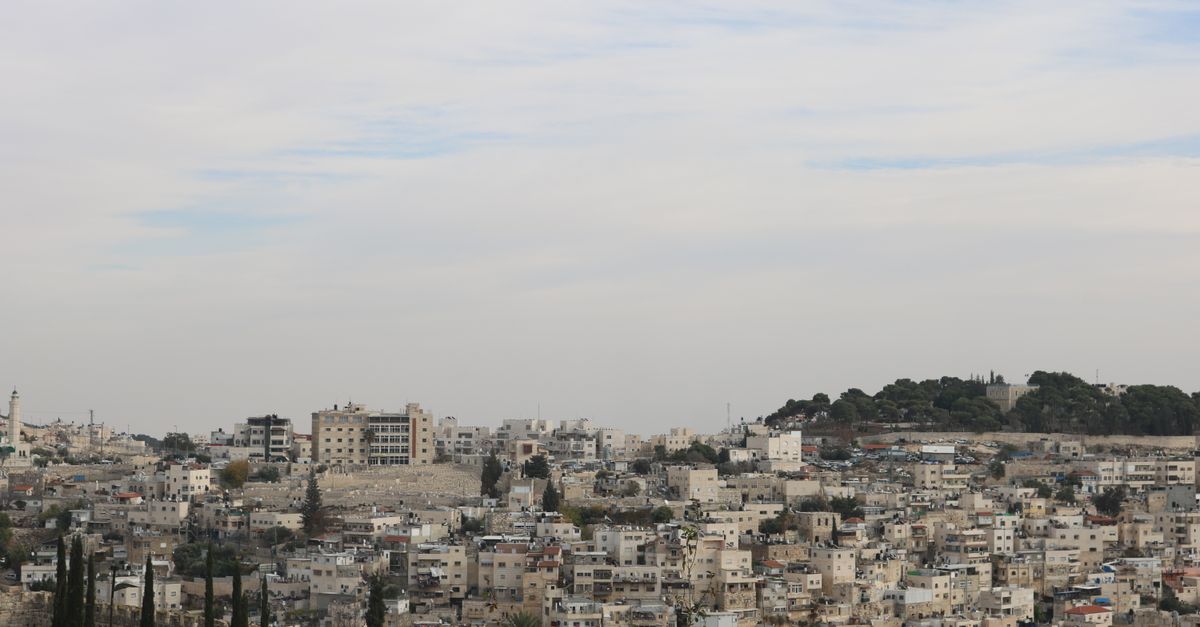 Aerial view of the historical architecture of Jerusalem, showcasing old city buildings and skyline.